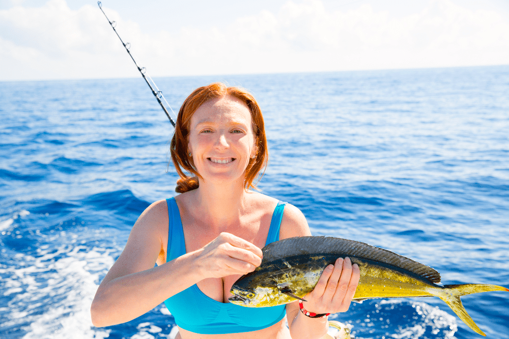 Photo of a Woman Who Caught a Fish on a Port Aransas Fishing Charter.